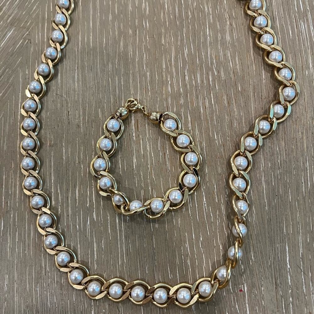 Faux pearl and gold bracelet and necklace